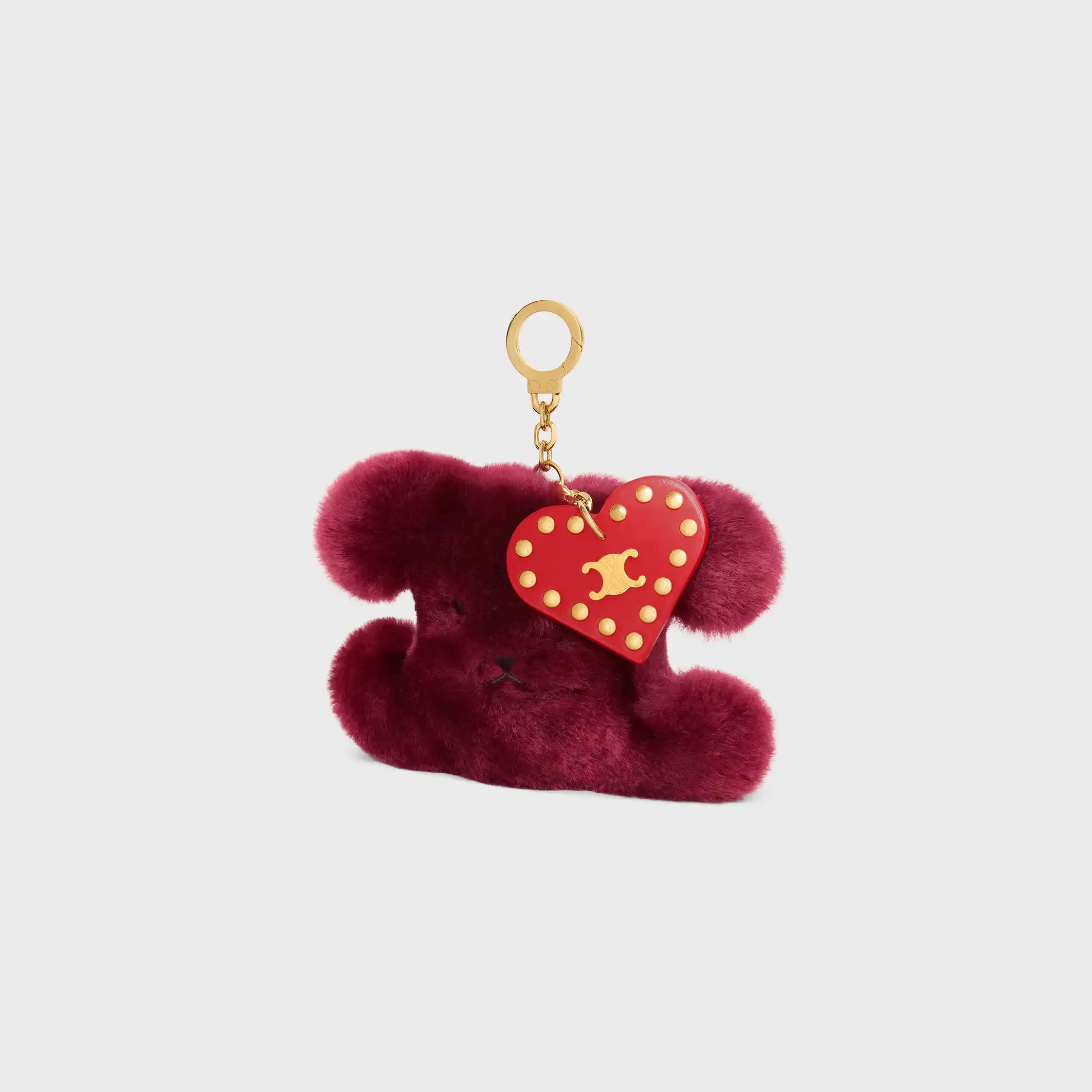 CHARM POM-POM TRIOMPHE EM PELÚCIA E COU DE VACAS
