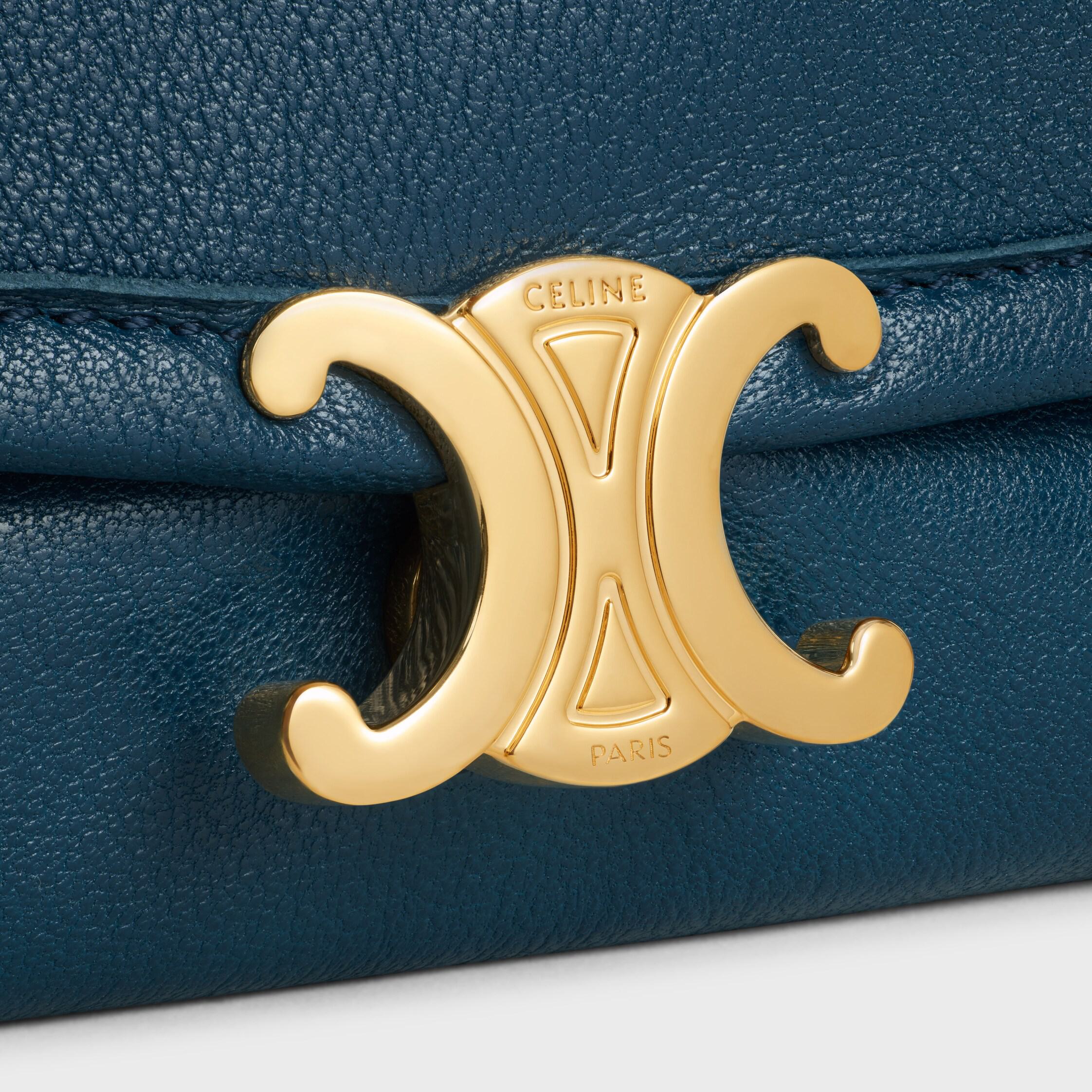 BOLSA HALFMOON SOFT TRIOMPHE EM COURO DE CORDEIRO MACIO E BRILHANTE