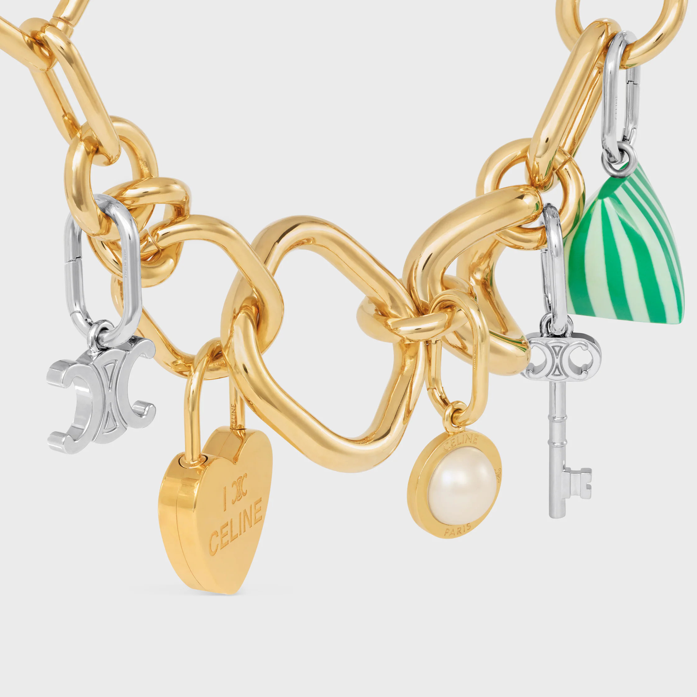 CHARM BERLINGOT EM RESINA E LATÃO COM ACABAMENTO EM RÓDIO