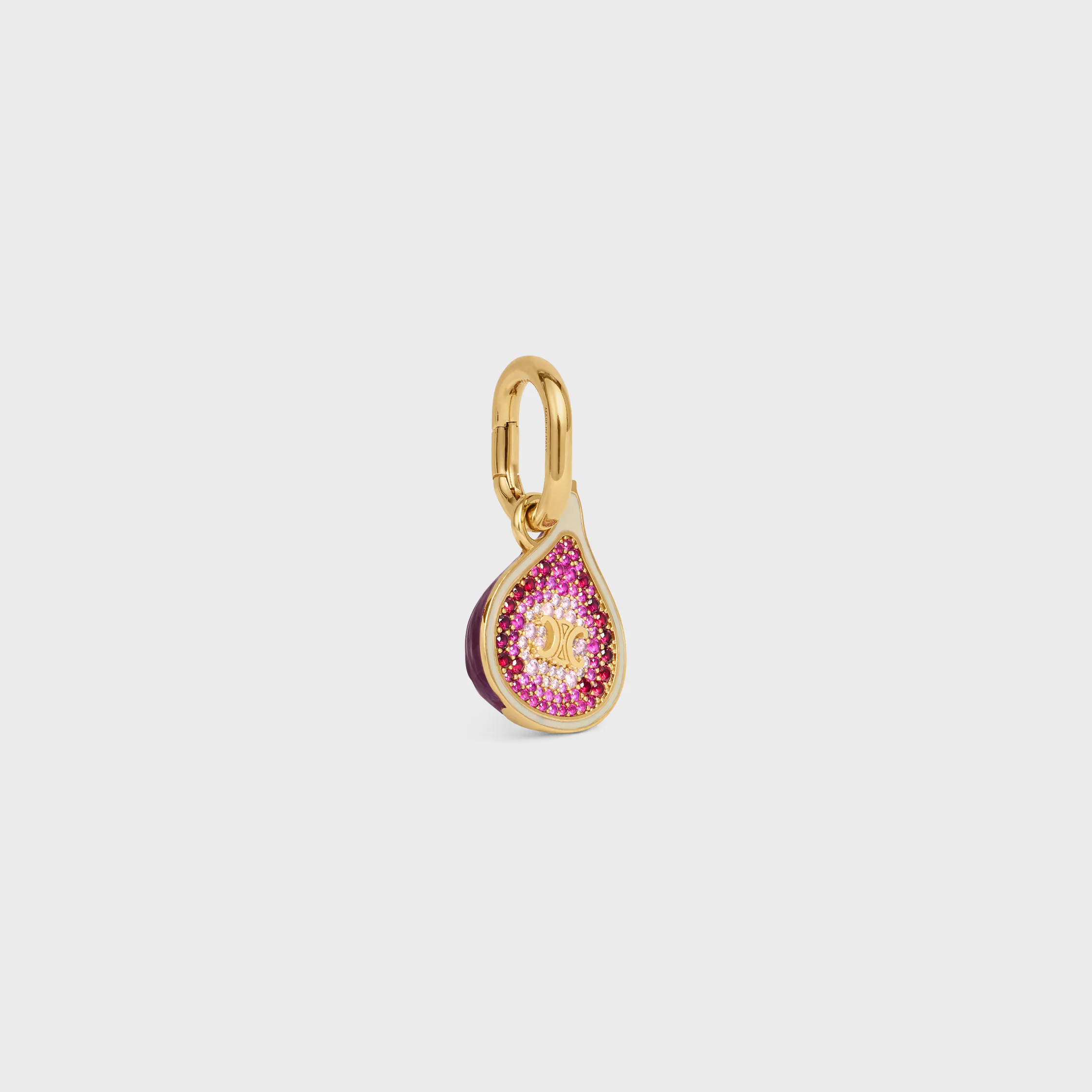 CHARM EM FORMA DE FIGURA EM BRONZE COM ACABAMENTO DOURADO, ESMALTE E STRASS