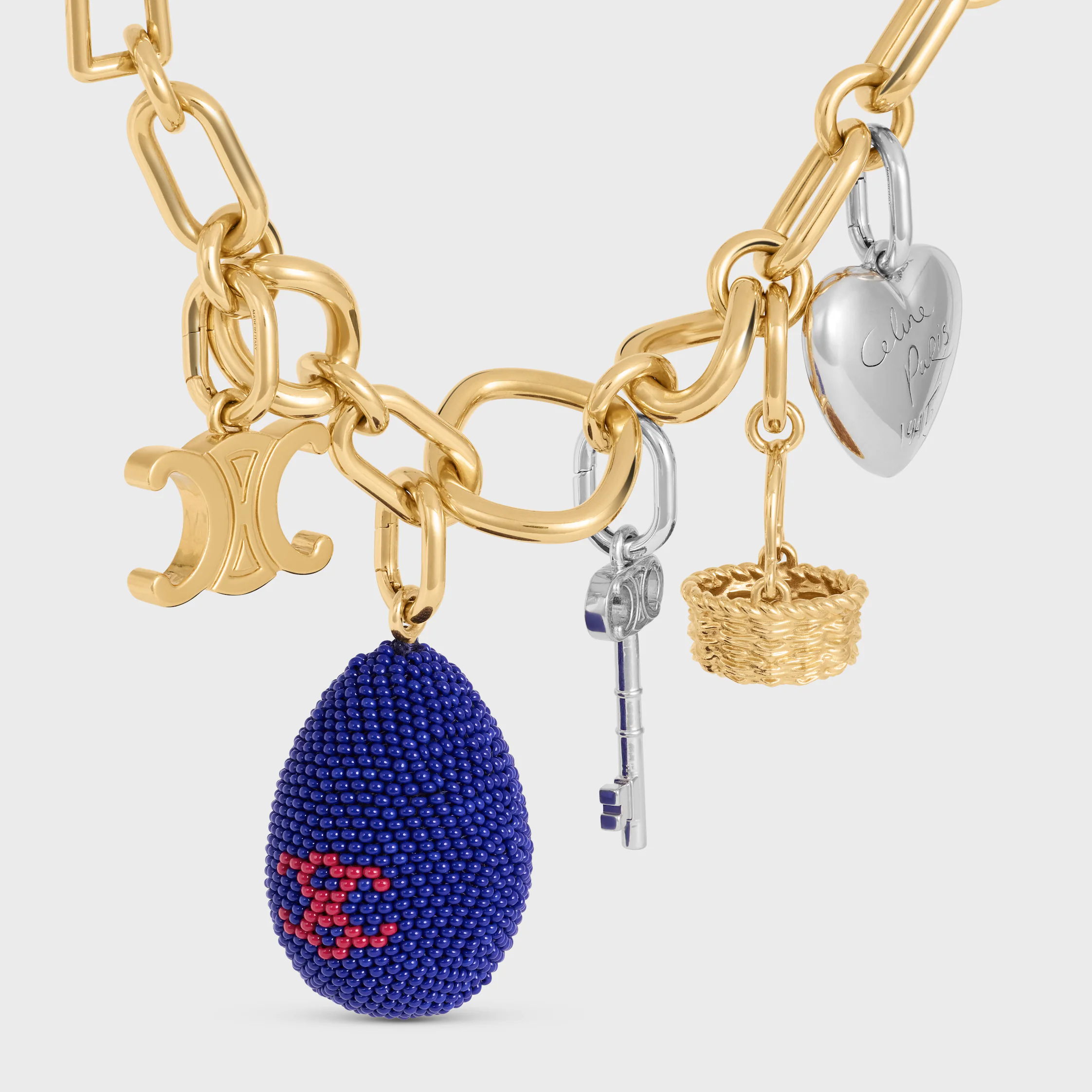 Pingentes Celine com Ovo em Contas e Latão com Acabamento Dourado