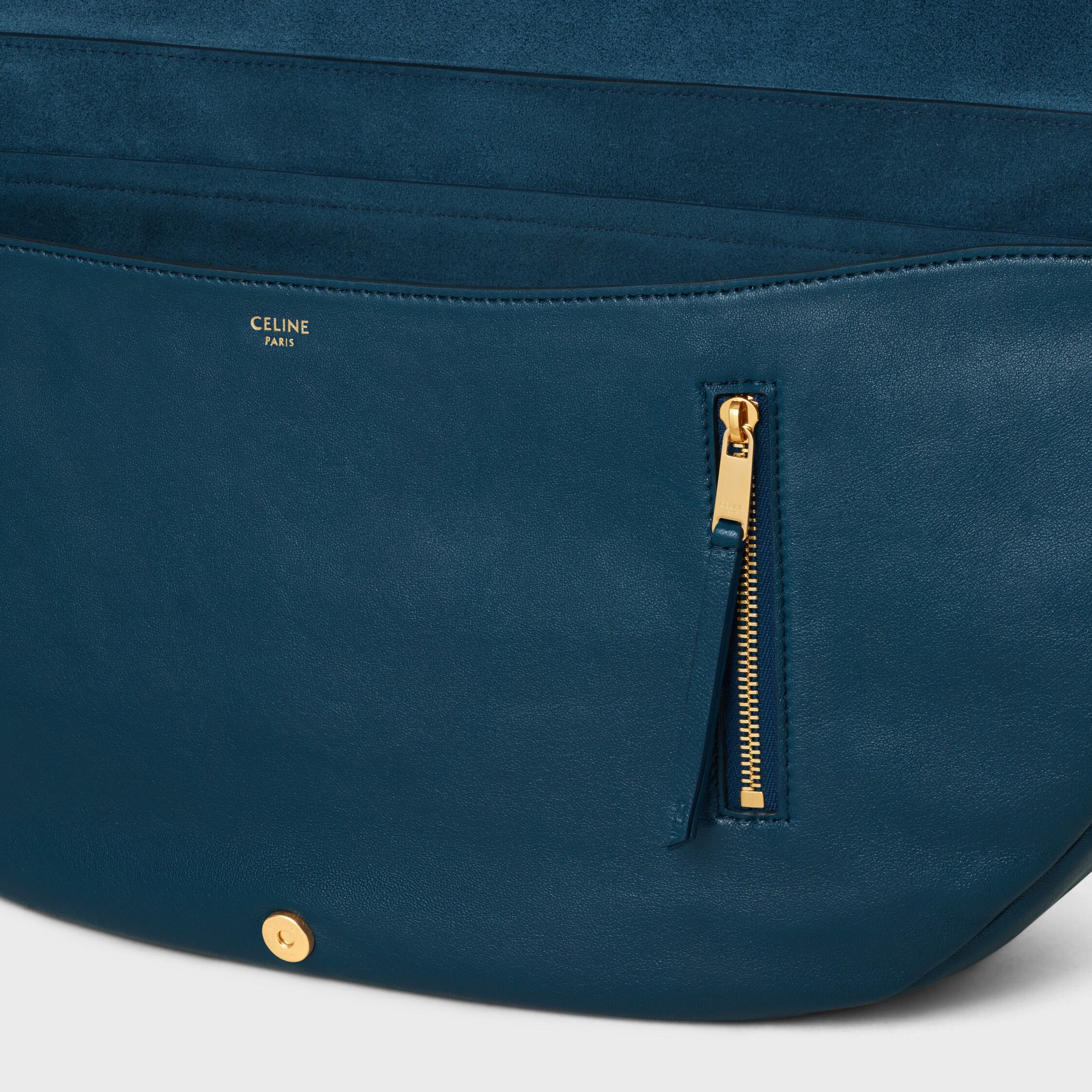 BOLSA HALFMOON SOFT TRIOMPHE EM COURO DE CORDEIRO MACIO E BRILHANTE